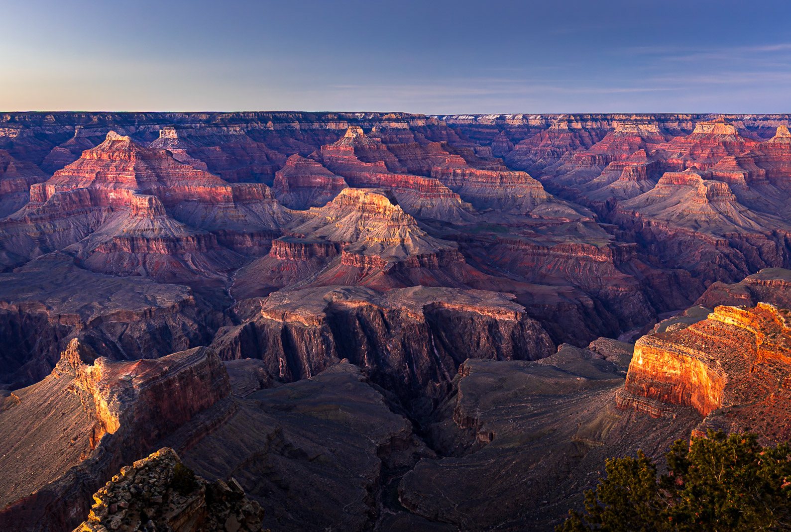 The Grand Canyon's layered ridges and buttes at sunset